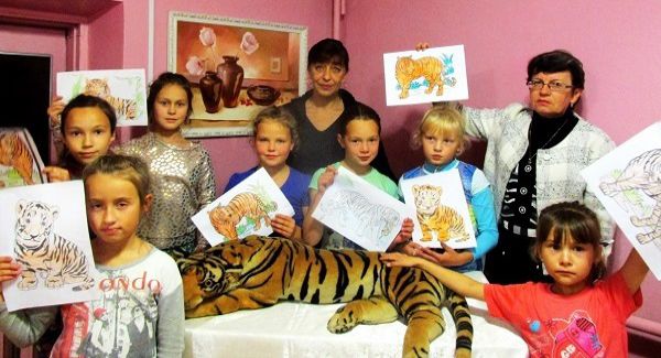 Участники акции - День тигра в Каменниковском ЦД